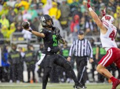 No. 6 Oregon Grinds Out Rain-Soaked Win Over Struggling Wisconsin