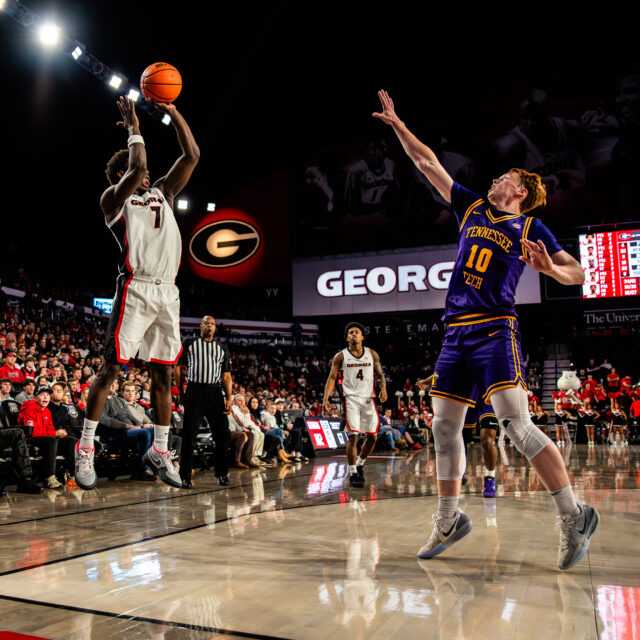 Senior Justin Bailey #7 shoots another 3-pointer for the day
